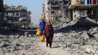 UN humanitarian chief Tom Fletcher has urged Israel to open more crossings into Gaza to expedite the delivery of humanitarian aid following warnings from Israel about limiting supplies due to delays in returning the bodies of hostages by Hamas. The imperative for action comes as the Rafah crossing remains closed and residents in Gaza begin hoarding food amidst soaring prices and fears that the ceasefire may collapse. Fletcher emphasized the need for both Israel and Hamas to adhere to ceasefire terms, insisting that withholding aid from civilians shouldn't be used as a bargaining tool.