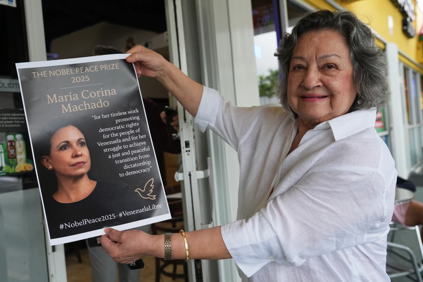 Venezuelans React to Machado's Nobel Win Amid Deportation Fears