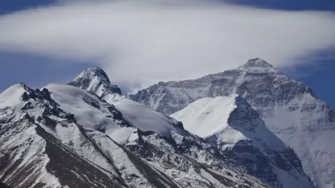 Blizzard Strikes Everest: Hikers Face Hypothermia as Rescues Continue