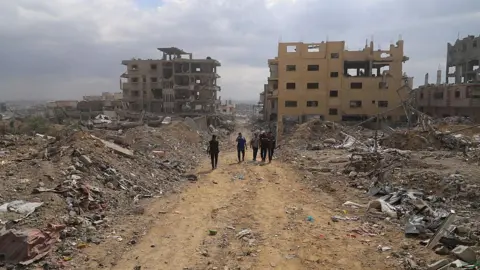 Tragedy Strikes in Gaza: 11 Family Members Killed as Israeli Shells Hit Bus