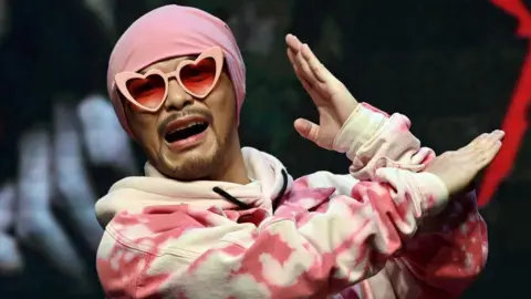 Controversy Surrounds Popular Rapper Namewee as He Faces Charges in Influencer Death