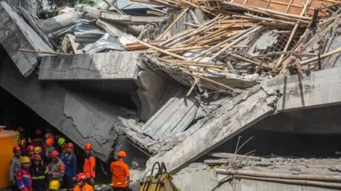 Tragedy Strikes: Indonesian School Collapse Claims Lives and Leaves Students Trapped