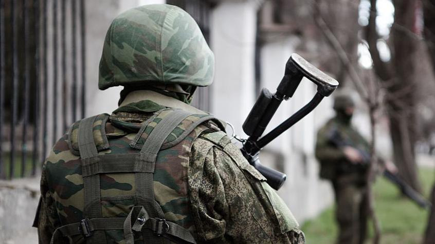 Russian soldier against backdrop