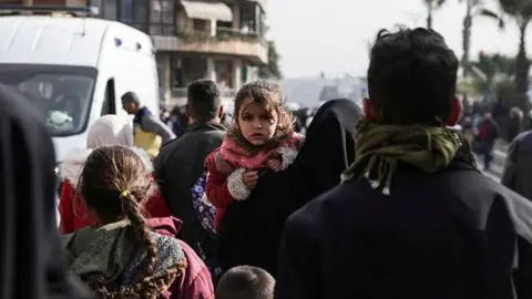 Civilians Flee Aleppo Amid Intense Clashes Between Syrian Forces and Kurdish Fighters