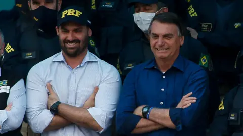 Charges Against Jair Bolsonaro's Son for Coercion Amid Father's Legal Troubles