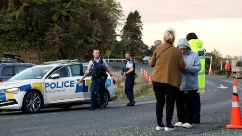 Parents of New Zealand Fugitive Apologize for Distress Caused by Son