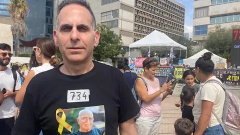 Hostage's Son Expresses Heartbreak Over Ongoing Battle Amidst Gaza Conflict