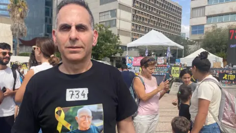 Hostage's Son Expresses Heartbreak Over Ongoing Battle Amidst Gaza Conflict