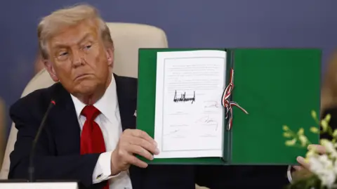 Trump Signs Gaza Peace Plan, Declares 'Rebuilding Begins'
