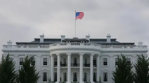 White House Warns of Mass Firings as Government Shutdown Looms
