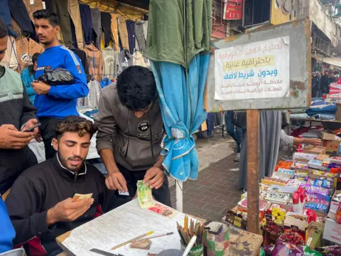 Survival Amidst Chaos: The Resurgence of Banknote Repairing in Gaza