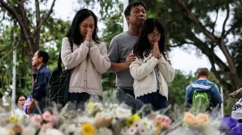 Tragedy in Hong Kong: Fire Death Toll Climbs to 146 Amid Mourning