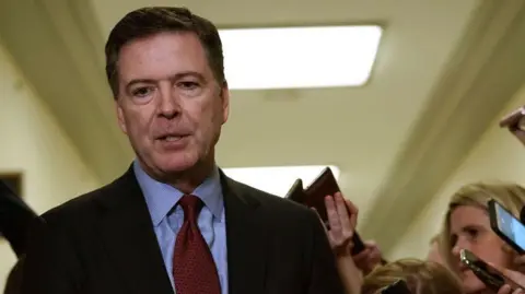 FBI Agent Suspended for Refusing to 'Perp Walk' James Comey